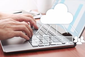 Cloud computing concept. Sharing data on server. Using laptop for sending data on cloud server.